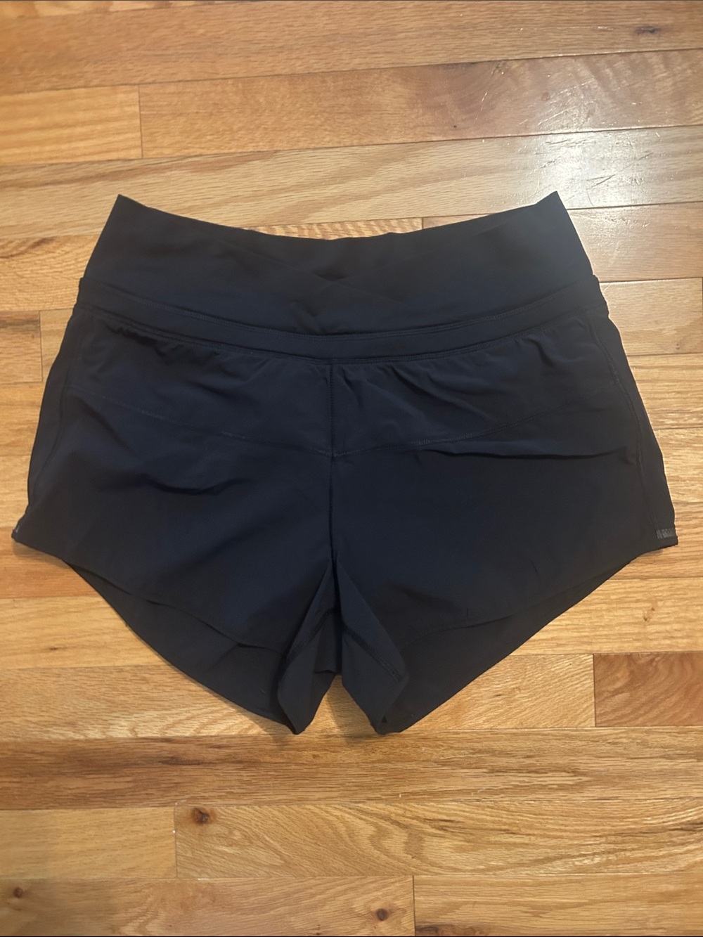 Lululemon Black Running Shorts. Size 6, twist crossover waist